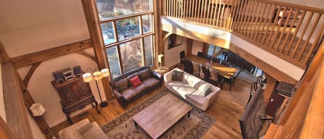 Living Room overlooking view from 2nd story - all located on 25 acres!