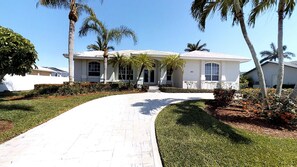 Front of home, late afternoon.