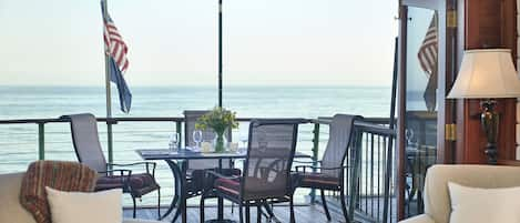 Dine al fresco to the tune of waves crashing below