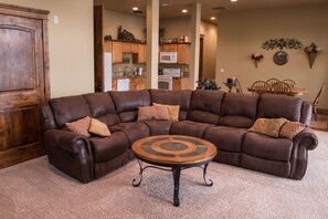 Family Room with TV and picture windows to the lake