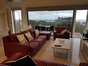 Upstairs living room with view of the ocean