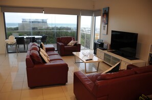 Upstairs living room with view of the ocean