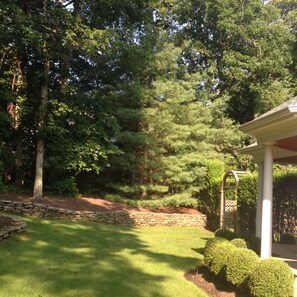front yard to the left of entrance