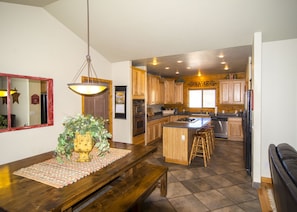 Full size kitchen & dining area w/ pantry and laundry off the side.