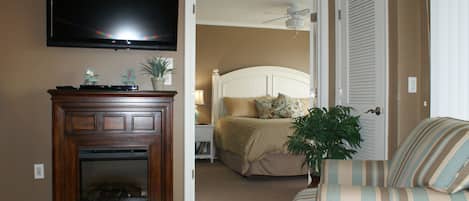 Living Area w/ Cozy Fireplace & Big Screen LCD TV