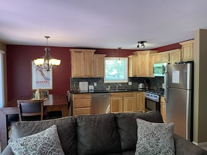 Kitchen and dining room view from family room