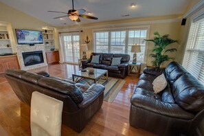 Top-Level Living Room with Deck Access
