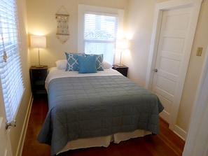 Bedroom with queen sized bed.