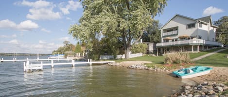 There's a private beach and pier in the backyard. There's room for your boat!