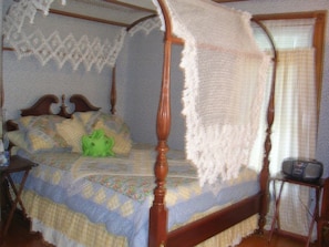 one of the queen bedroom