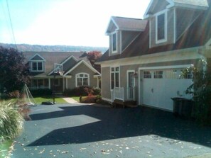 Drive to the main house with detached rec room and exercise room on the right