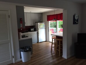 view of kitchen from den