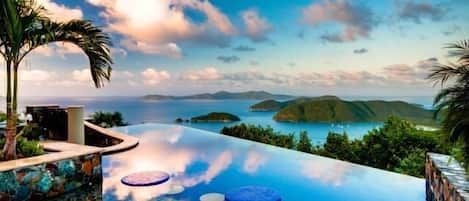 Infinity Pool with Sun Shelf, Cocktail Tables & views to Cinnamon Bay Beaches