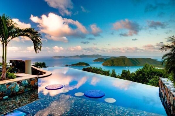 Infinity Pool with Sun Shelf, Cocktail Tables & views to Cinnamon Bay Beaches