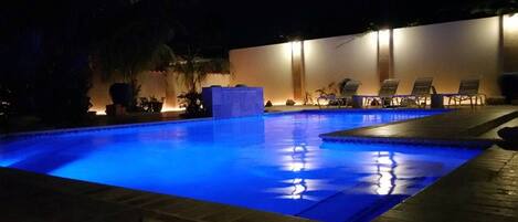 beautiful pool, waterfall & pool bar, jetted jacuzz bench, pool table and more