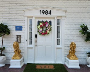 Enter through the elegant front door and feel the warm welcome.