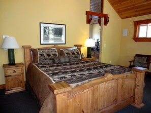 Master bedroom with private bathroom, jetted tub and hot tub on the deck.