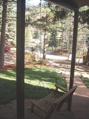 Front porch swing with view of lake