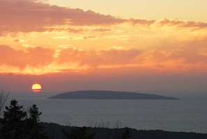 spectacular sunset views of ocean and SeaWolf island