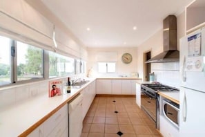 Clean, bright kitchen with SMEG oven