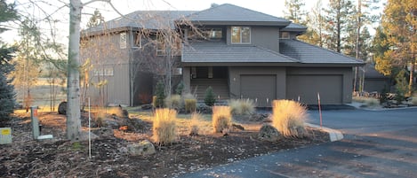 Front of the home, large driveway, 3 car garage