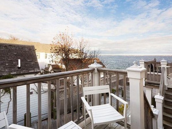 Enjoy the sunrise and beautiful water views from the private deck