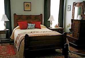 bedroom with antique queen bed and daybed