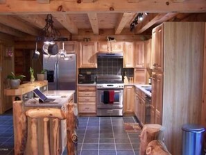 Spacious fully stocked Kitchen with Island.