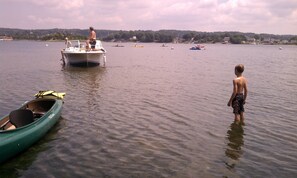 recommend water shoes, kayaks are available to use