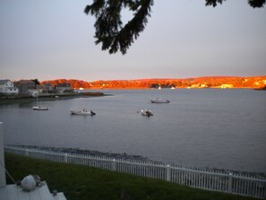 sunset lighting opposite side during low tide