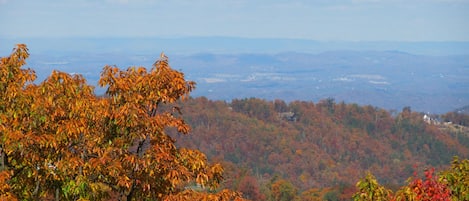 The autumn view from upper deck frames Pigeon Forge in the distance.