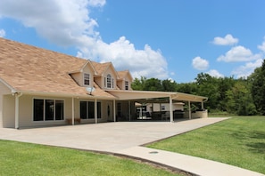 Patio, partially covered and approximately 40X60 feet.