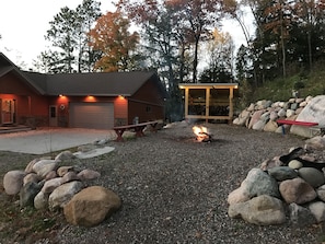 Campfire area with picnic table and benches. Great views of the lake.