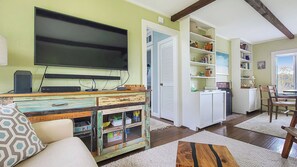 Living room with comfortable seating and flat screen TV