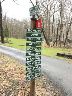 Turn onto King Fisher Cove and driveway to Canvasback Cottage.