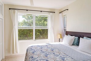 Experience the cozy comfort of our King Size Bedroom, thoughtfully designed to provide a homely atmosphere. Equipped with room darkening shades, air conditioning, and ceiling fans, we ensure a restful and comfortable stay that exceeds your expectations