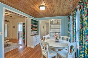 Walk from your kitchen and dining through French Doors into your living room.