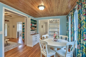 Walk from your kitchen and dining through French Doors into your living room.