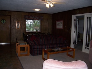 Open living room and Dining room with view of lake