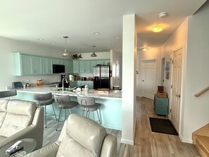 Barstools and plenty of kitchen counter space