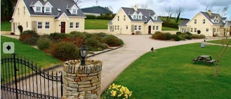 Group of 3 cottages situated on the hill. 