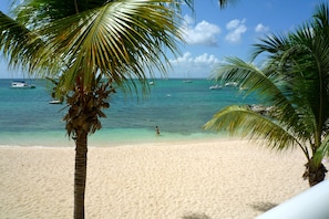 A beach directly at your feet just under your terrace overlooking the sea.