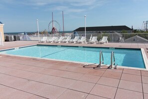 Relax at the Pool with large sun deck.