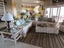 Large Great Room with comfortable couches and island decor