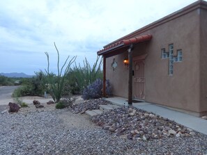 Front of casita and looking North. Concrete ramp (Not fully handicap accessible)