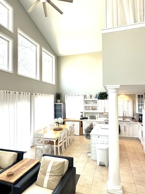 Seating for all your guests in the kitchen + 102 bottle/100 can refrigerator