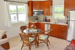 Discover a fully-equipped, luxurious kitchen featuring high-end appliances to fulfill all your culinary desires