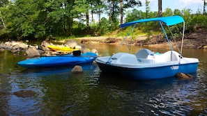 Kayaks, tubes, and a paddle boat are available to use for free
