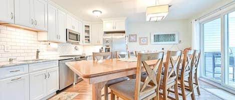 Newly remodeled kitchen with large table that seats 10