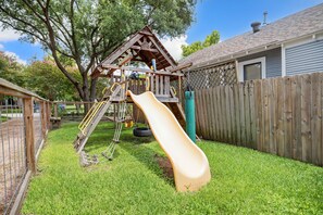 Playfort, climb, slide, swing.  Fully fenced. Shared with house next door